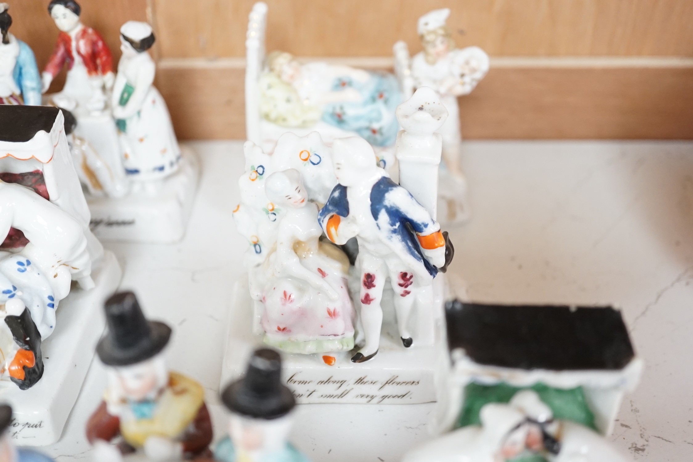 A collection of 14 German porcelain Fairings and a related book - Antiques collectors guide by Derek H. Jordan
